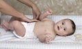 Mom baby diaper change Royalty Free Stock Photo