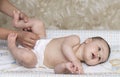 Mom baby diaper change Royalty Free Stock Photo