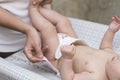 Mom baby diaper change Royalty Free Stock Photo