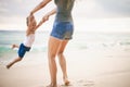 Mom and baby playing near beach. Traveling with family, child Royalty Free Stock Photo