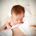 Mom breastfeeding newborn tiny baby Royalty Free Stock Photo