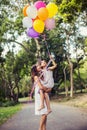 Mom carrying his daughter with nature and sunlight, enjoyment family Royalty Free Stock Photo