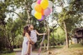 Mom carrying his daughter with nature and sunlight, enjoyment family Royalty Free Stock Photo
