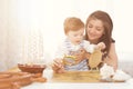 Mom and child making model ship. Concept of sea, adventures and travel Royalty Free Stock Photo