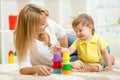 Mom and child playing block toys at home Royalty Free Stock Photo