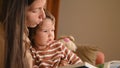 Mom and child read a book before bedtime child