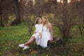 Happy family walks in the spring meadow