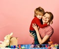 Mom and child spend time together making Easter decorations