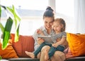 Mom and child with tablet Royalty Free Stock Photo