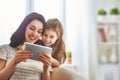 Mom and child with tablet Royalty Free Stock Photo