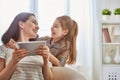 Mom and child with tablet Royalty Free Stock Photo