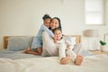 Mom, children and hug on bed, portrait and happy family home with love, care and bonding together. Young kids, mother Royalty Free Stock Photo