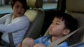 Mom complain to a boy in a car during traffic jam