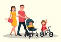 Mom and dad with a baby in a stroller, and daughter riding a bike. Royalty Free Stock Photo