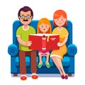 Mom, dad and daughter reading story book together