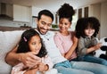 Mom, dad and happy kids on couch, watching tv and family bonding together in living room. Smile, happiness and parents Royalty Free Stock Photo