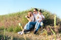 Mom, dad and little daughter. Happy family on the walk.