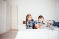 Mom dad and son in the morning lying on the bed at home Royalty Free Stock Photo