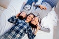 Mom dad and son in the morning lying on the bed at home in a good mood Royalty Free Stock Photo