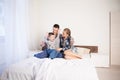 Mom dad and young son in the bedroom after sleeping House Royalty Free Stock Photo