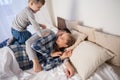 Mom dad and young son in the bedroom after sleeping House Royalty Free Stock Photo