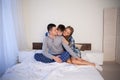 Mom dad and young son in the bedroom after sleeping House Royalty Free Stock Photo