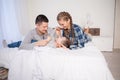 Mom dad and young son sleep on the bed in the bedroom Royalty Free Stock Photo