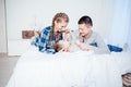 Mom dad and young son sleep on the bed in the bedroom Royalty Free Stock Photo