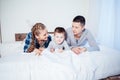 Mom dad and young son sleep on the bed in the bedroom Royalty Free Stock Photo