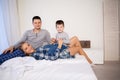 Mom dad and young son sleep on the bed in the bedroom Royalty Free Stock Photo