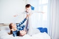 Mom dad and young son sleep on the bed in the bedroom Royalty Free Stock Photo