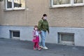 Mom and daughter with facemasks against coronavirus.