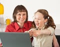 Mom and daughter with laptop