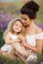 Mom and daughter on a lavender field