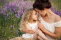 Mom and daughter on a lavender field