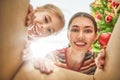 Mom and daughter opening a Christmas present Royalty Free Stock Photo