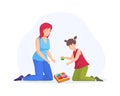Mom and daughter playing logic board game together. Happy family collecting wooden puzzle on floor. Mother and daughter having