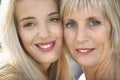 Mom and daughter smiling.