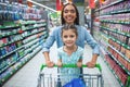 Mom and daughter in the supermarket Royalty Free Stock Photo