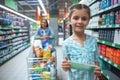 Mom and daughter in the supermarket Royalty Free Stock Photo