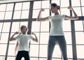 Mom with daughter working out at home Royalty Free Stock Photo