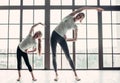 Mom with daughter working out at home Royalty Free Stock Photo