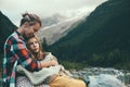 Mom with daughter wrapped in blanket Royalty Free Stock Photo