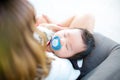 Mom feeding her baby daughter infant from bottle Adorable baby with a milk bottle. Royalty Free Stock Photo