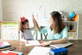 Mom and girl enjoying homeschool together