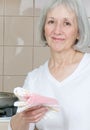 Mom/Grandma In The Kitchen Royalty Free Stock Photo