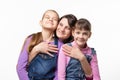 Mom happily clung to her daughters, isolated on white background Royalty Free Stock Photo