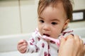 Mom help baby brush teeth Royalty Free Stock Photo