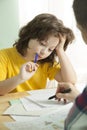 Mom helps my son to do difficult homework Royalty Free Stock Photo