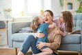 Mom and her daughters are playing Royalty Free Stock Photo